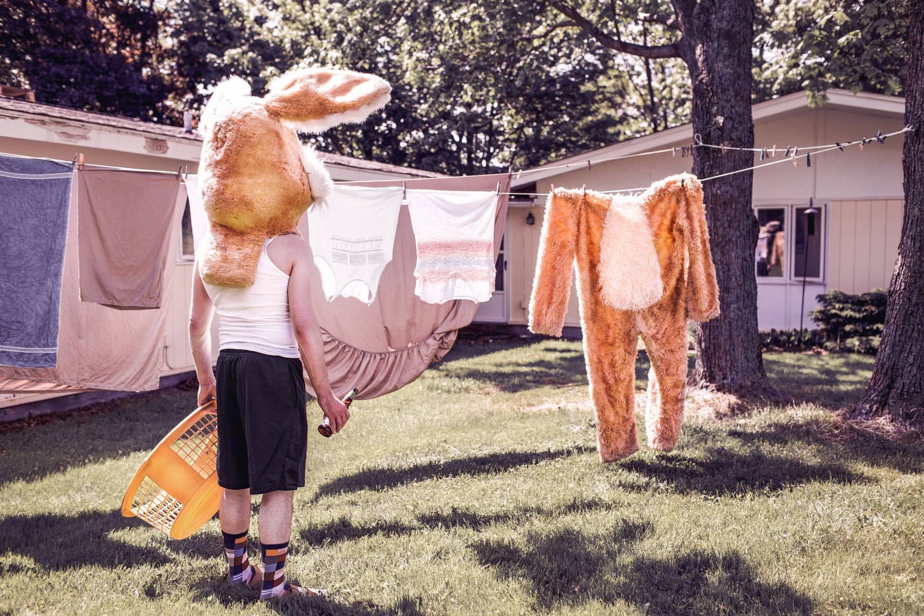 A man hanging laundry