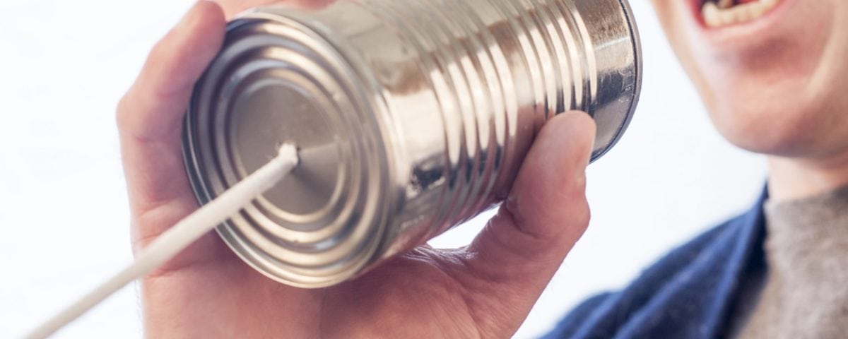 A man holding a can