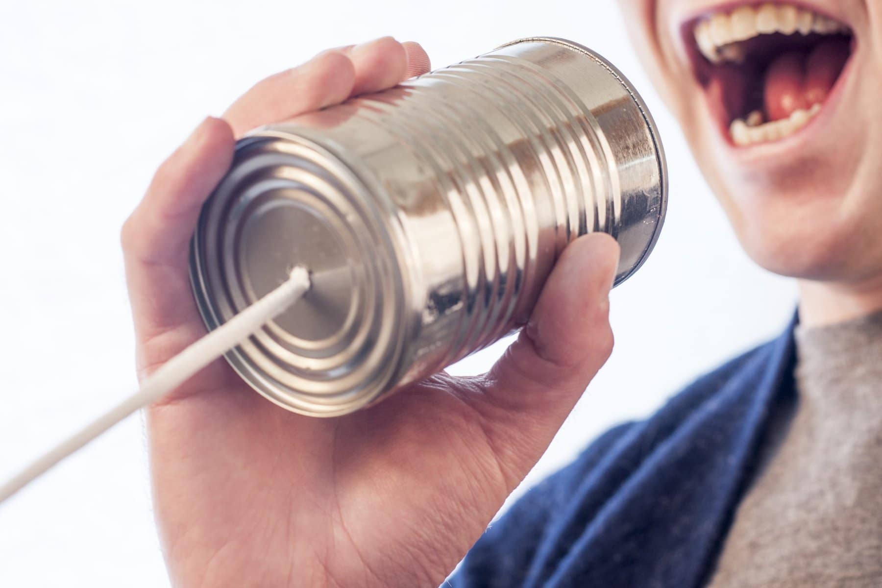 A man holding a can