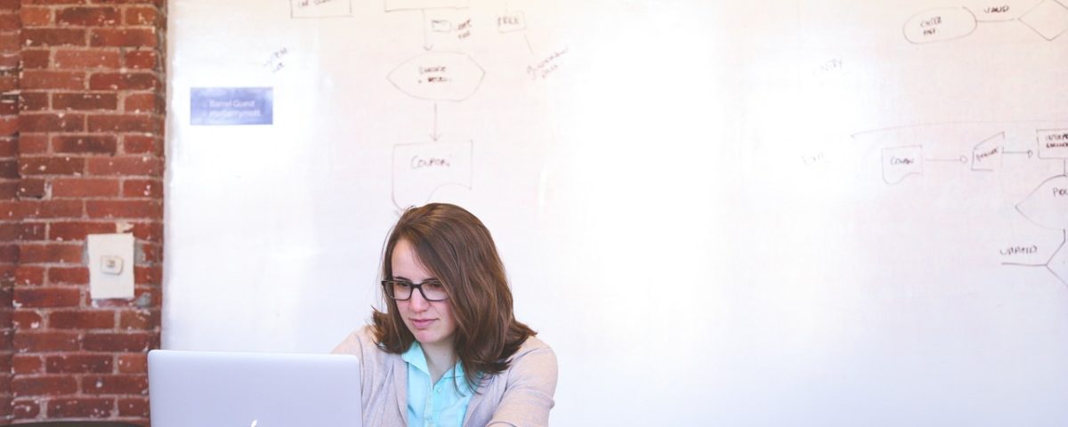 A woman working in an office room