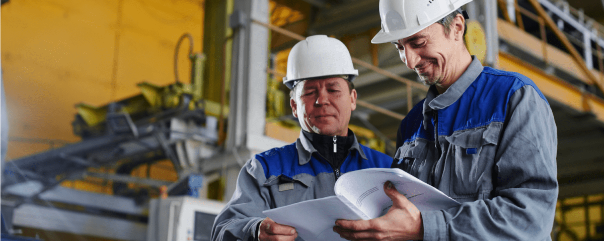 Two man working in a manufacturing facility