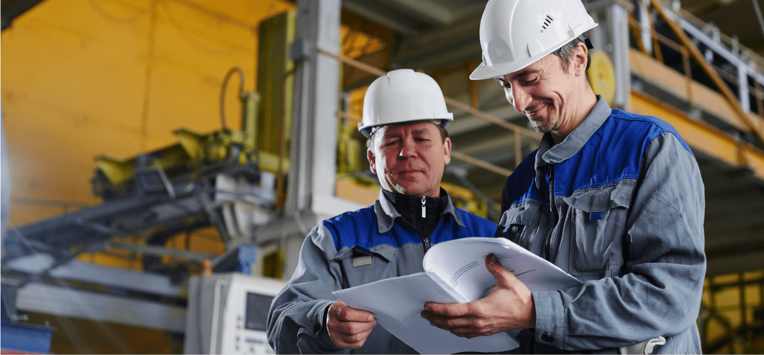 Two man working in a manufacturing facility