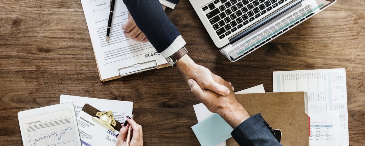 Two businessmen shaking hands