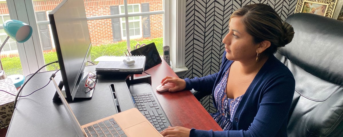 A woman working by the computer