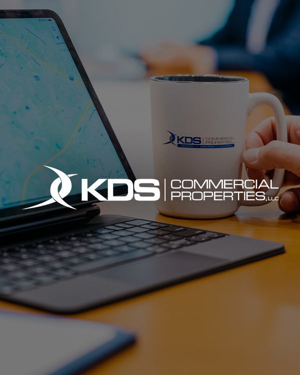 KDS properties logo on an office background